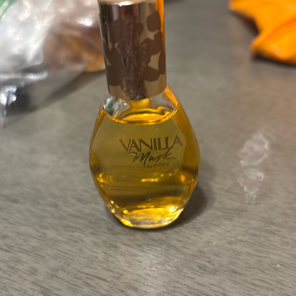 Almost full. Bottle of vanilla musk .375floz